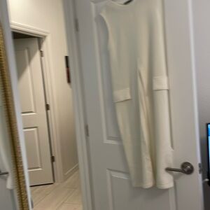 Long cream Zara top opens in front